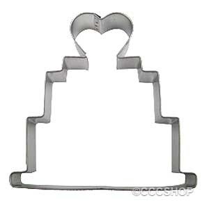 Cookie cutter wedding cake topper