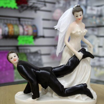 Comical Wedding Cake Topper - Got Him by the Foot