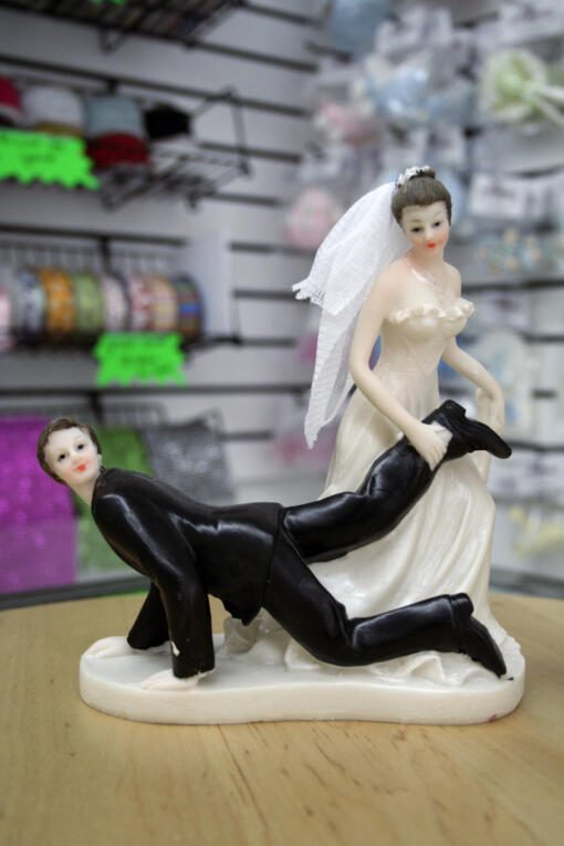 Comical Wedding Cake Topper - Got Him by the Foot