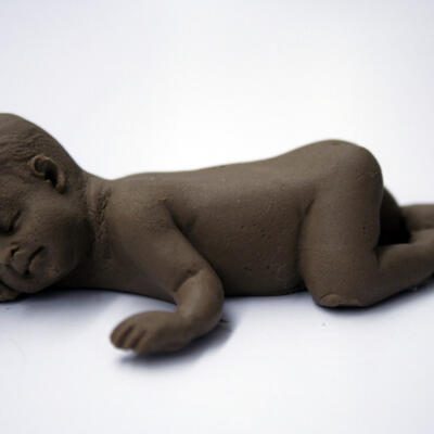 Fondant Realistic Baby Cake Topper- Laying Dark Skin