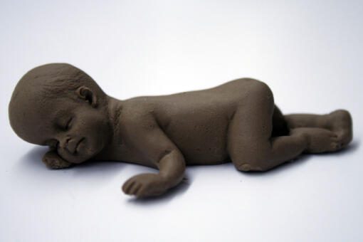 Fondant Realistic Baby Cake Topper- Laying Dark Skin