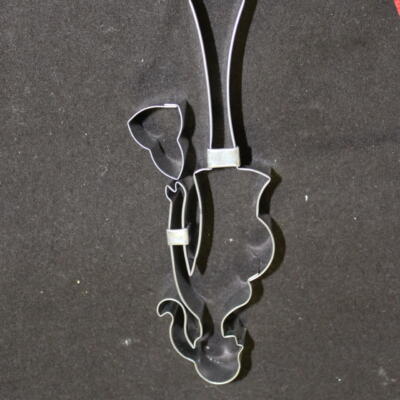 Pregnant Lady with Purse Cutter